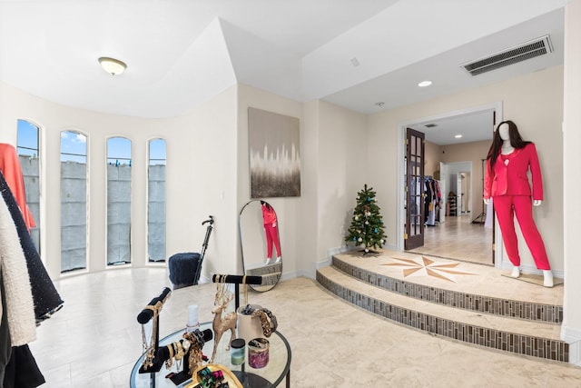 interior space with light tile patterned floors