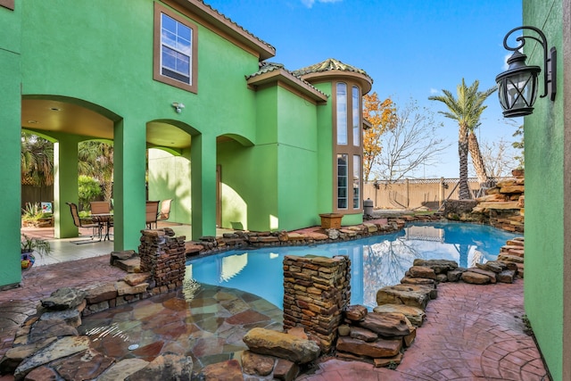 view of pool with a patio