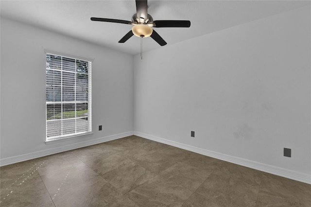 unfurnished room featuring ceiling fan