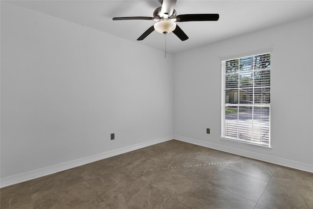 empty room featuring ceiling fan