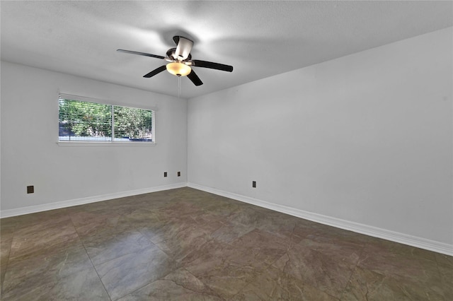 unfurnished room with ceiling fan