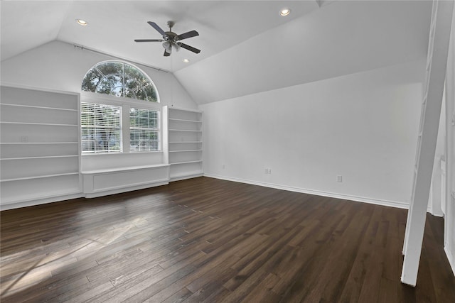 additional living space featuring ceiling fan, dark hardwood / wood-style floors, vaulted ceiling, and built in features