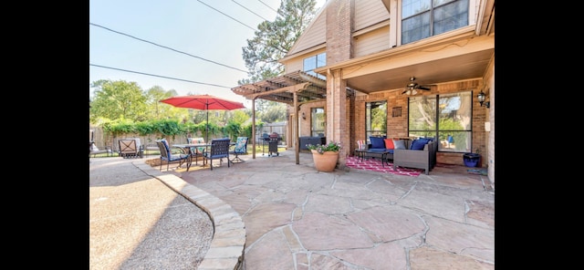 view of patio / terrace with ceiling fan, outdoor lounge area, and a pergola