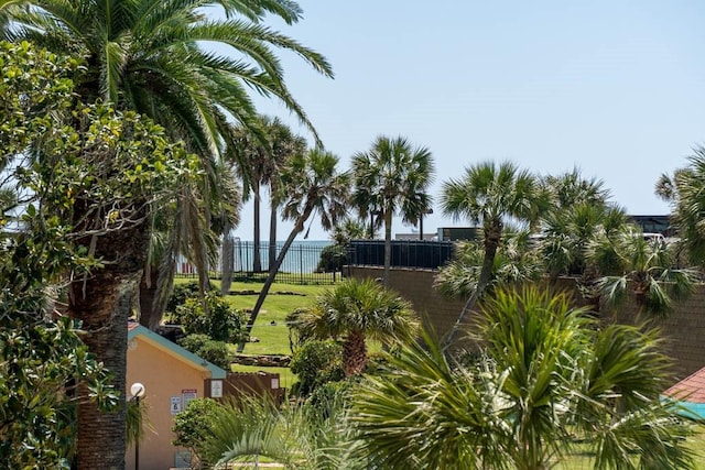 view of home's community with a water view