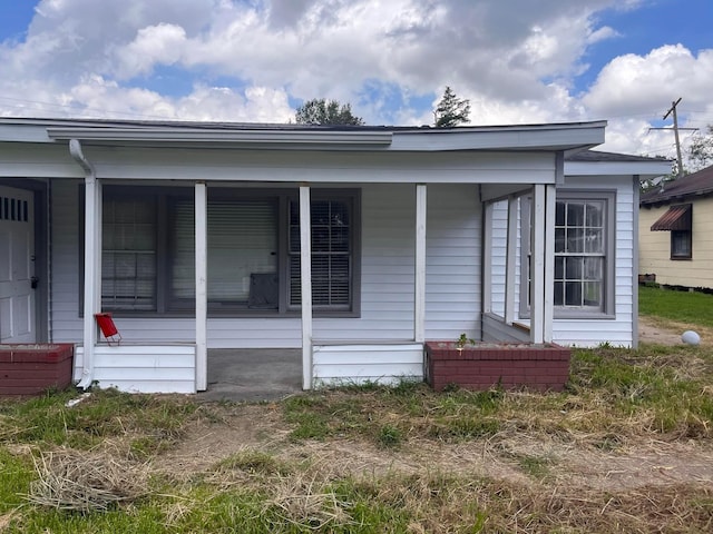 exterior space featuring covered porch