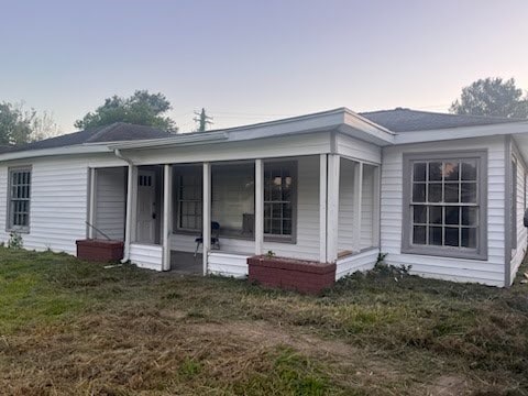 exterior space with a lawn