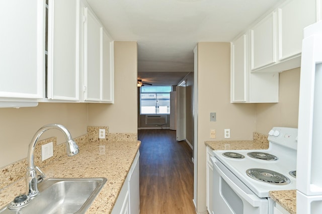 kitchen featuring dark hardwood / wood-style flooring, ceiling fan, sink, white cabinets, and white electric range