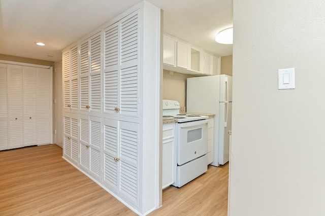 hallway featuring light hardwood / wood-style flooring