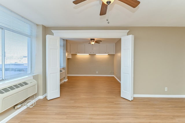 empty room with light wood-type flooring