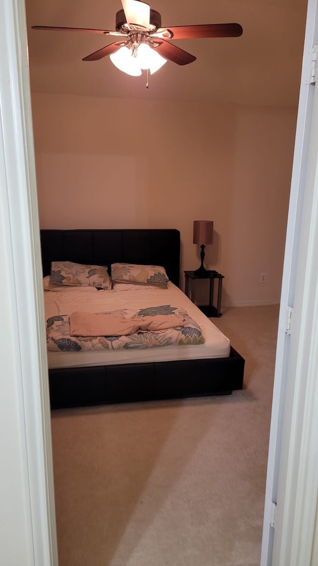 2106 Whirlaway Dr, Stafford, TX 77477 - bedroom featuring ceiling fan and carpet