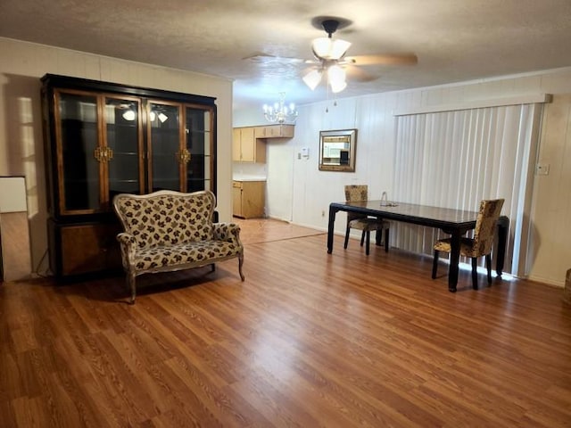 living area featuring ceiling fan and hardwood / wood-style flooring