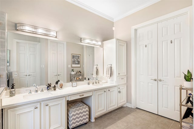 bathroom featuring vanity, tile patterned flooring, and ornamental molding