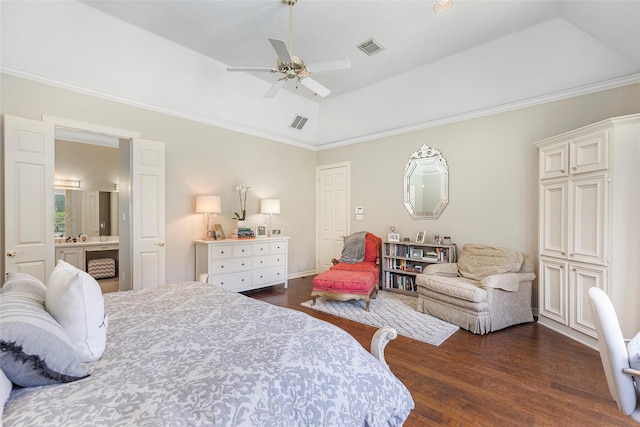 bedroom featuring vaulted ceiling, ceiling fan, a tray ceiling, and dark hardwood / wood-style floors