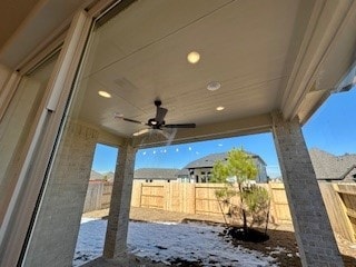 view of patio featuring ceiling fan