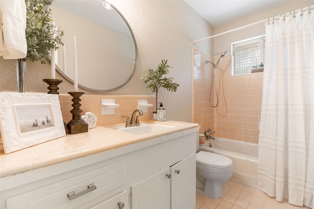 full bathroom with vanity, shower / tub combo, toilet, and tile patterned flooring