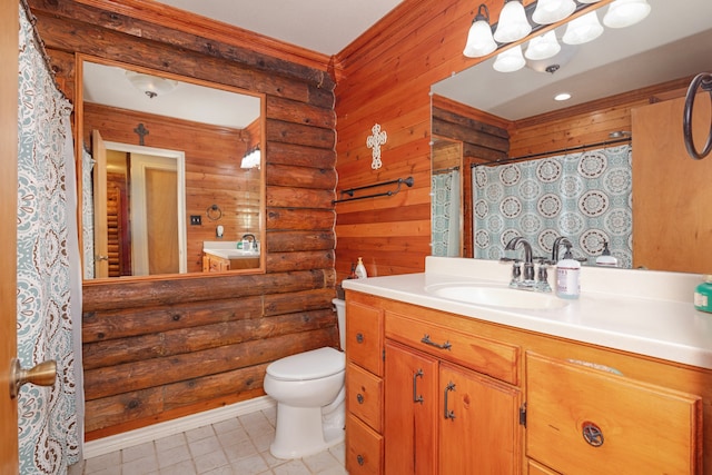 bathroom featuring vanity, toilet, tile patterned floors, and log walls