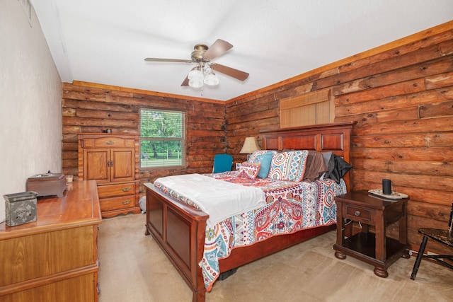 bedroom with light carpet, rustic walls, and ceiling fan