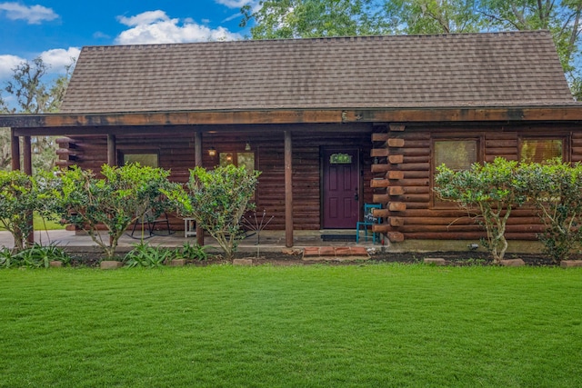 exterior space featuring a front lawn