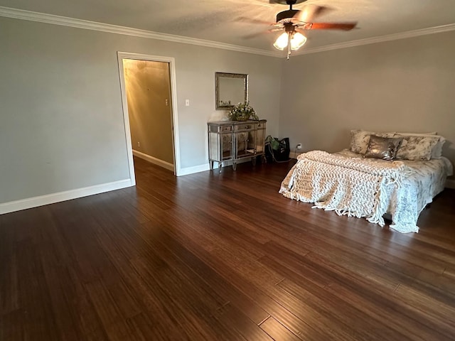 unfurnished bedroom with ceiling fan, dark hardwood / wood-style flooring, and ornamental molding