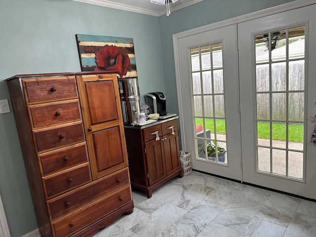 doorway featuring ornamental molding and french doors