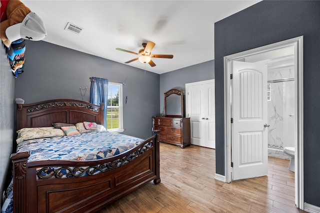 bedroom featuring ceiling fan and light hardwood / wood-style flooring