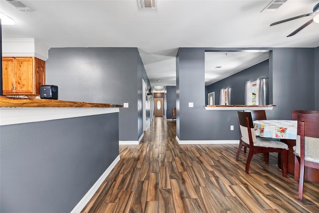 hallway with dark hardwood / wood-style flooring