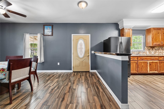 entryway featuring dark hardwood / wood-style floors and ceiling fan