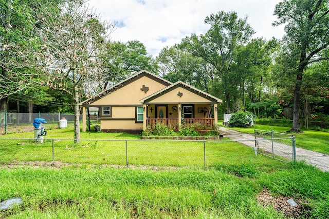 bungalow-style house featuring a porch and a front lawn