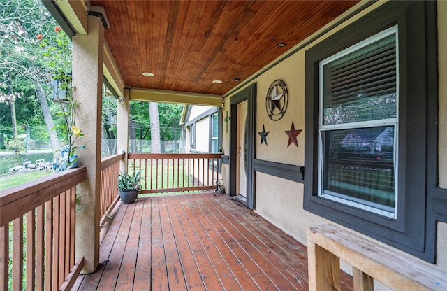 wooden terrace with covered porch