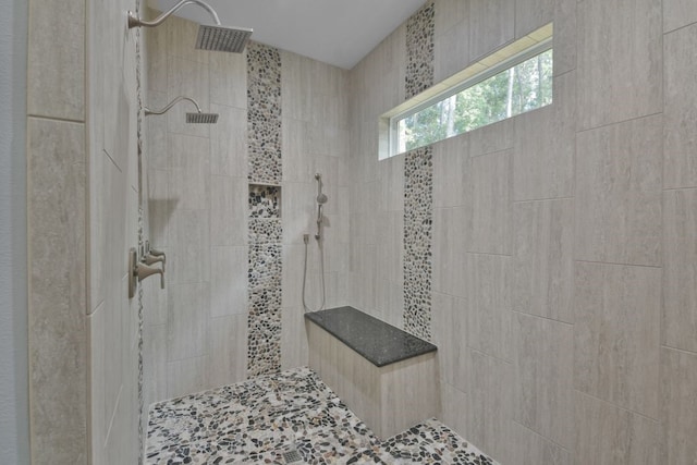 bathroom featuring tiled shower