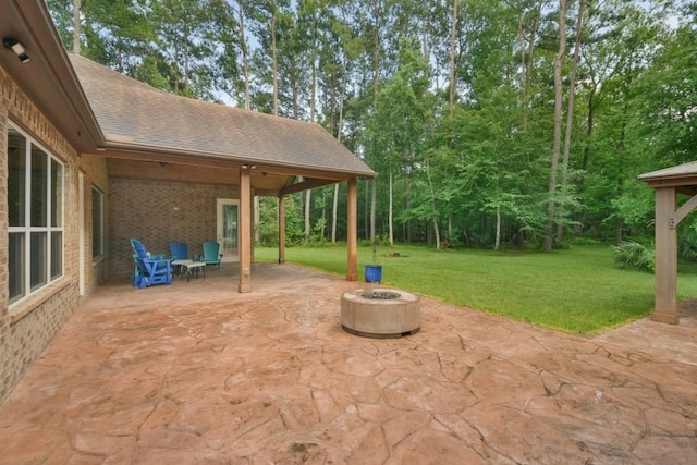 view of terrace featuring a fire pit