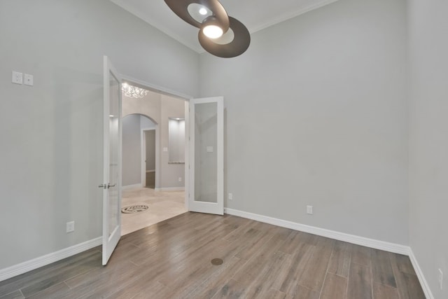 unfurnished bedroom with wood-type flooring and ceiling fan