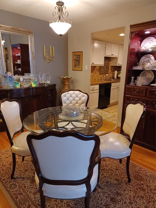 dining area with light wood-type flooring