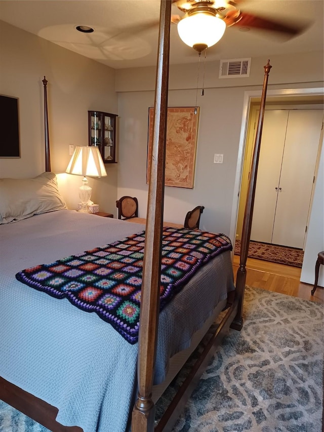 2016 Main St Unit 605, Houston, TX 77002 - bedroom with wood finished floors and a ceiling fan