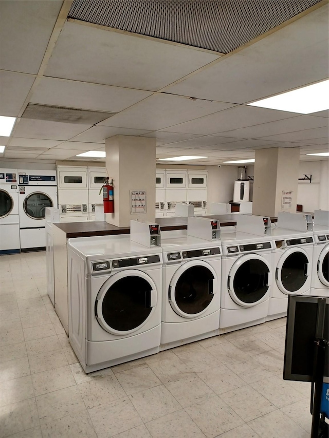 laundry area featuring washer and dryer and stacked washing maching and dryer