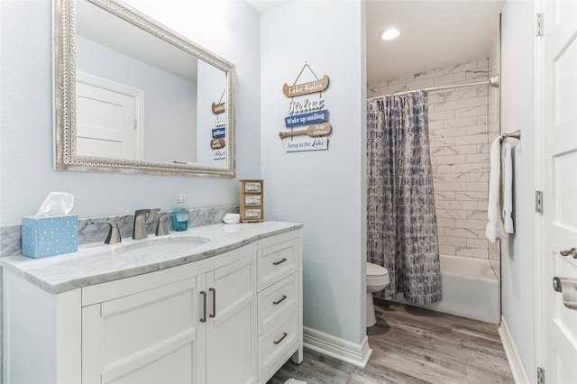 full bathroom featuring shower / bath combination with curtain, wood-type flooring, vanity, and toilet