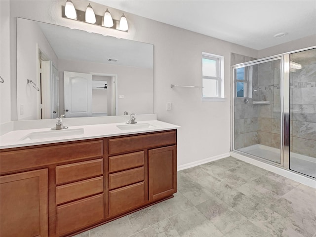 bathroom featuring walk in shower and vanity