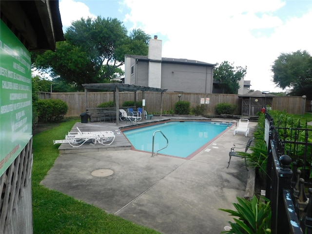 view of swimming pool featuring a patio