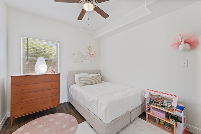 bedroom with ceiling fan and hardwood / wood-style flooring