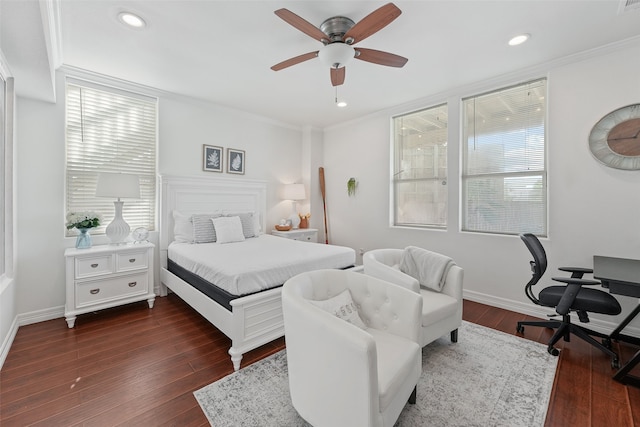 bedroom featuring ornamental molding, dark hardwood / wood-style flooring, and ceiling fan