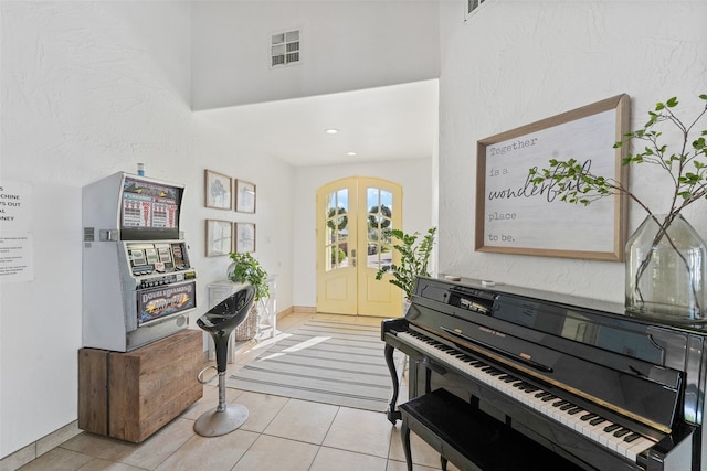 misc room with light tile patterned flooring