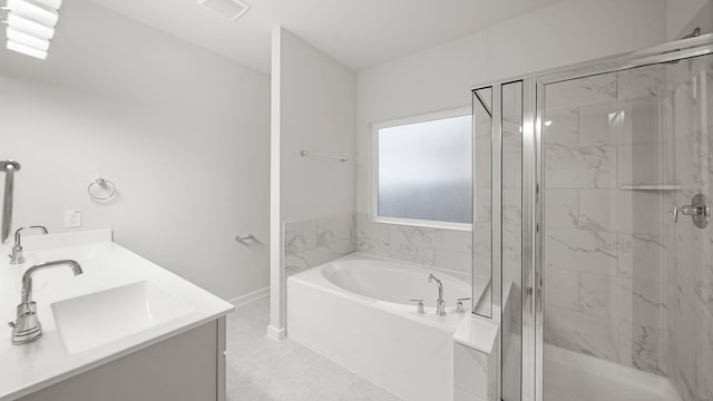 bathroom featuring separate shower and tub, tile patterned flooring, and vanity