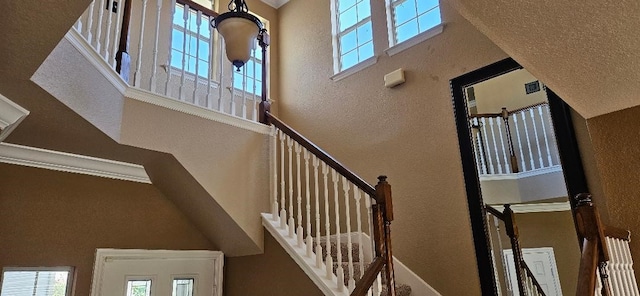 stairs with a high ceiling