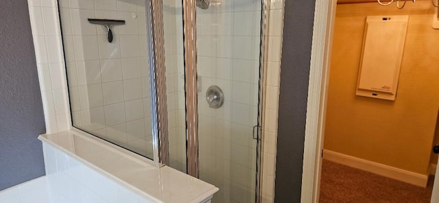 bathroom with an enclosed shower