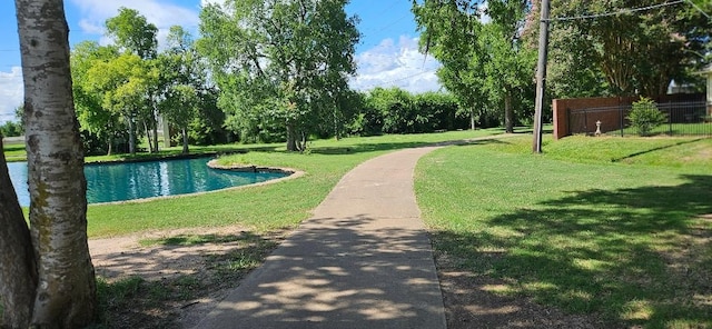 view of home's community with a lawn