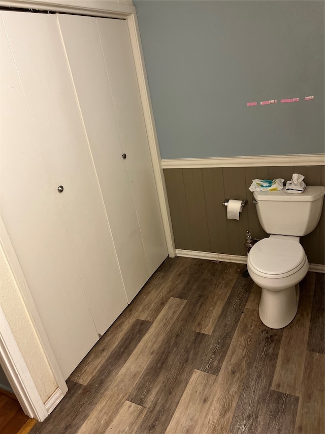 bathroom featuring toilet and hardwood / wood-style floors