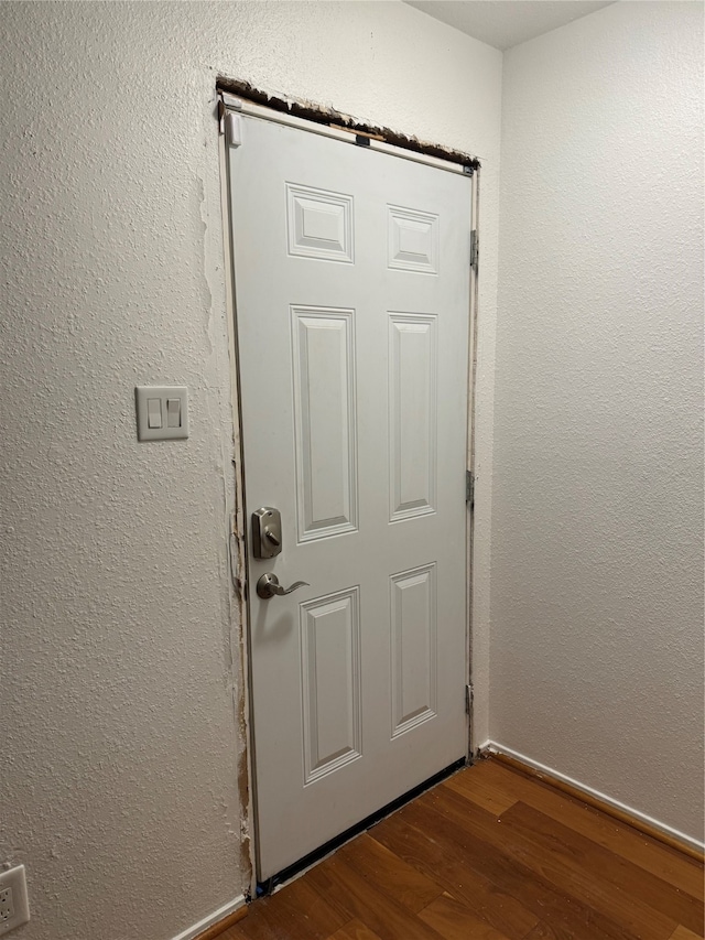 doorway featuring hardwood / wood-style flooring