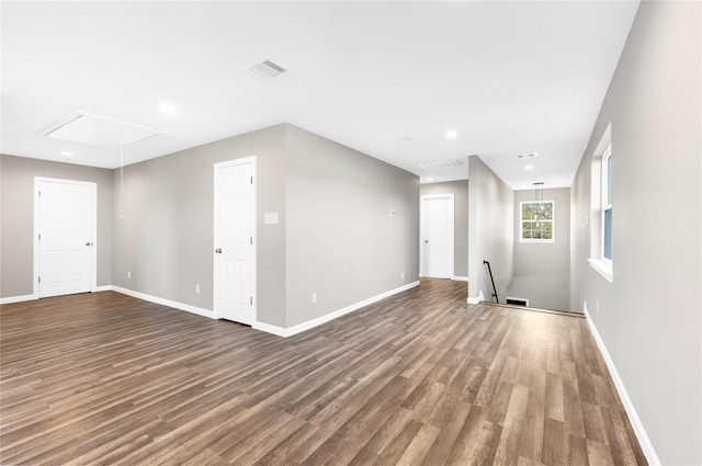 empty room with hardwood / wood-style floors