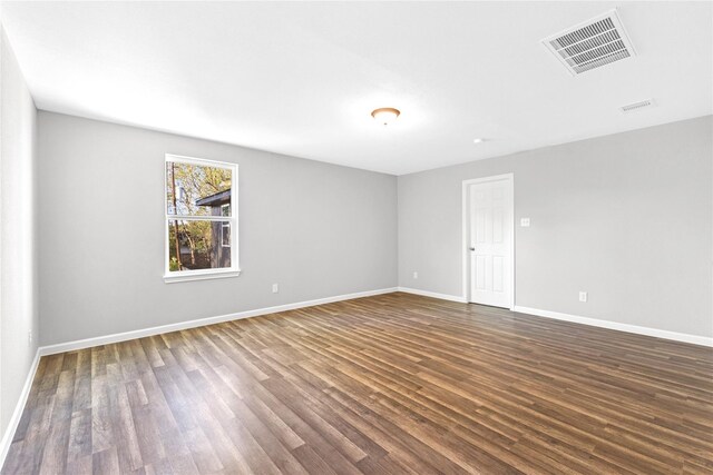 empty room featuring hardwood / wood-style floors