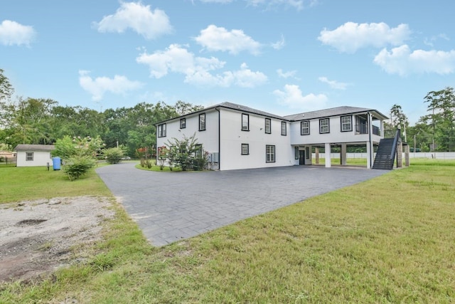 view of home's exterior featuring a yard